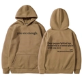 Women's camel fleece hoodie featuring front kangaroo pocket and back text print - XS / Khaki - Black Print
