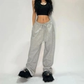 Women's baggy grey joggers with drawstring waist in a stylish wide-leg street style - Light Gray