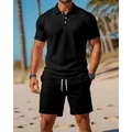 Heren zomerse tweedelige set bestaande uit zwart poloshirt met korte mouwen en bijpassende short - S / Zwart
