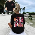 Vue détaillée du t-shirt noir en coton avec imprimé floral See Good In All Things - S / Image Personnalisée