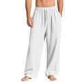 Detalle de los pantalones de lino blanco para hombre con cintura elástica y bolsillos laterales - S / Blanco