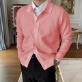 Dettaglio ravvicinato di un cardigan da uomo in maglia rosa corallo con colletto e bottoni - M / Rosa