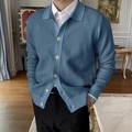 Classic blue men's buttoned knit cardigan with rib cuffs in an elegant indoor setting - Blue