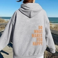 Gray oversized hoodie with orange Do What Makes You Happy back print on a model - S / Tops / Light Grey with Yellow Text