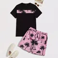 Set estivo da uomo con maglietta e pantaloncini con coulisse e stampa di palme tropicali - M / Rosa