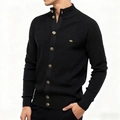 Detail of black men's knit cardigan featuring a stand collar and brown marble buttons - S / Black