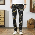 Heren slim fit casual broek met geel en witte abstracte verfprints op zwarte stof - EU 28 / Zwart Bedrukt