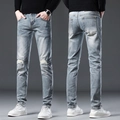 Men's slim fit light blue distressed denim jeans with paint splatter and ripped details - EU 28 / Light Blue (DQ820#)