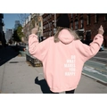 Back view of pink oversized hoodie for women featuring inspirational white text print - S / Pink (White Logo)