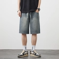 Pantaloncini di denim da uomo con motivo a stelle, vestibilità ampia per l'estate - M / Blu Vintage