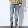 Lässige Herren Jeanshose in verwaschenem Blau im klassischen Vintage Streetwear-Design - EU 28 / Gewaschenes Blau