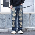 Herren Blue Jeans in lockerer Passform mit starken Distressed-Details und Riss-Effekten - EU 28 / Dunkelblau