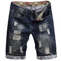 Deep blue ripped denim shorts for men featuring white splatters and paisley pattern lining - EU 38 / Dark Blue Washed Ripped Style (TY779#)