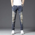 Slim Fit Herren-Bikerjeans in Mittelblau mit Knie-Falten und Reißverschlusstaschen - EU 28 / Vintage-Blau