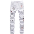 Jean blanc ajusté pour homme avec détails usés et imprimés graffitis de style urbain - Blanc