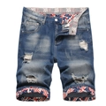 Men's mid-waist ripped denim shorts in blue with American flag print lining details - EU 28 / Blue