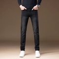 Schmal geschnittene, dunkelgraue Stretch-Jeans für Herren mit modischer Waschung und urbanem Stil - EU 28 / Schwarz und Grau