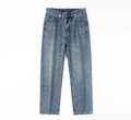 Detail of light wash blue denim jeans featuring a white vertical REPRESENT brand woven label - EU 30 / Blue