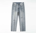 Detailed macro shot of vintage blue wash denim texture with distressed ripped effects - EU 28 / Blue