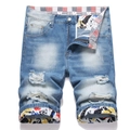 Slim fit light blue distressed denim shorts for men with colorful graffiti print lining - EU 32 / Blue