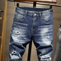 Slim-Fit Herrenjeans im Streetstyle, retro-blau gewaschen mit Rissen und Farbspritzern - EU 28 / Vintage-Blau