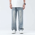 Lichtblauwe wijde herenjeans met inktspatdetails en gewassen afwerking - EU 28 / Blauw