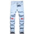 Jean slim bleu clair avec empiècements paisley aux genoux et taches de peinture - EU 28 / Bleu clair