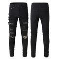 Men's black skinny ripped jeans with rhinestone grid inserts and a punk street style look - EU 33 / Black