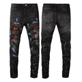 Schmal geschnittene schwarze Herrenjeans mit Destroyed-Effekten und roten Strass-Patches - EU 28 / Schwarz