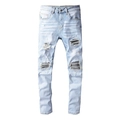 Slim fit light blue distressed jeans with grey patched rips and washed cat-whisker texture - EU 38 / Light Blue