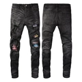 Schmal geschnittene dunkelgraue Herren-Jeans mit bunten Aufnähern und Rissen im Destroyed-Look - EU 33 / Schwarz