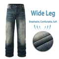 Men's loose fit deep blue jeans with distressed wash and vintage whiskered texture - EU 30 / Heavy Deep Blue Wash (306)