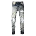 Jeans azzurri slim fit da uomo con toppe bianche e dettagli strappati stile street - EU 38 / Azzurro