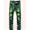 Detail der Slim Fit Jeans mit neongrüner Acid-Wash-Optik und plissierter Textur - EU 30 / Grün