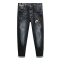 Slim-Fit Herrenjeans in Schwarz mit Wascheffekt, Destroyed-Details und Insektenstickerei - EU 28 / Schwarz