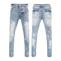 Detail of slim fit light blue jeans featuring hand-painted splatters and distressed rips - EU 28 / Light Blue Splatter Ripped Style