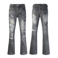 Detailed shot of grey washed flare jeans with distressed rips and colorful paint splatters - 6369 / EU 38
