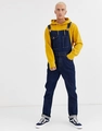 Classic dark blue denim overalls for men with front pockets and yellow hoodie - S / Blue
