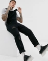 Men's solid black ripped denim overalls with adjustable straps and chest pockets - Black