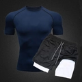Detail of men's quick-dry sports set with navy compression shirt and 2-in-1 black shorts - M / Top And Bottom / Dark Blue And Black