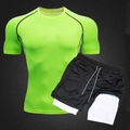 Detail of double-layer swim trunks with drawstring and neon green compression t-shirt - M / Fluorescent Green Top And Black Shorts