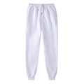 Dettaglio dei pantaloni jogger bianchi con vita elastica a coulisse e tasche laterali - Bianco