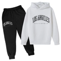 Kids Los Angeles tracksuit featuring white hoodie and black joggers for active wear - 100cm / White