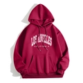 Detail view of burgundy hoodie featuring Los Angeles arch letter print and kangaroo pocket - Red (LOS ANGELES CALIFORNIA)