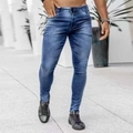 Close-up of men's slim fit jeans in mid-dark blue with natural washed faded effect - S / Blue