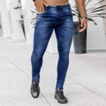 Detail view of men's slim fit blue jeans showing whiskering and distressed thigh patterns - S / Dark Blue