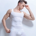 Detail view of seamless white compression tank top with smooth moisture-wicking fabric - M / White