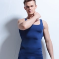 Detail of navy blue seamless men's slimming vest with wide shoulder straps and U-neckline - M / Dark Blue