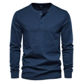 Detail of navy blue long sleeve Henley shirt featuring three-button collar and ribbed cuffs - Sapphire Blue