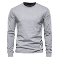 Detalle de camiseta gris claro de manga larga con puños acanalados y etiqueta tejida - Gris claro